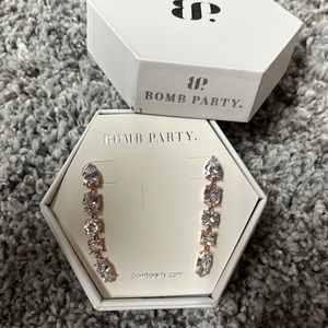 New in the box never worn bomb party diamond cubic zirconia, rose gold earrings.